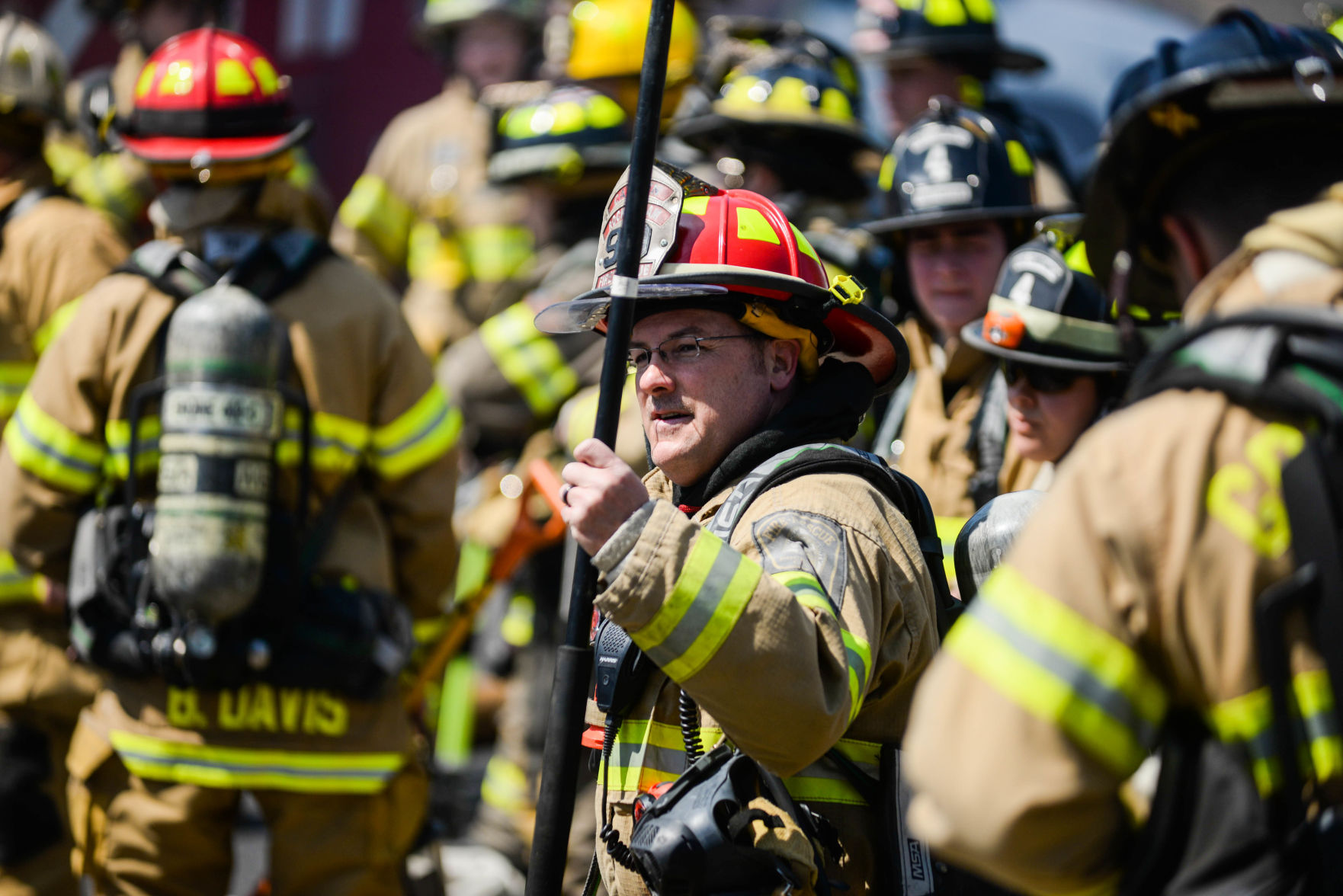 firefighter with long pole